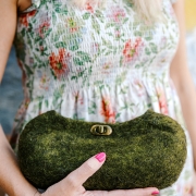 Green handmade wool clutch with bronze clasp