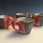Cup set, soda fired, carved and underglazed