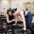 Julie Kaminski coaching a client on a Megaformer at Form studio in Charleston, guiding proper form during a Lagree workout.
