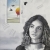 Black and white painting of a woman looking at an open door