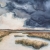 Blue storm cloud over a marsh watercolor