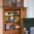 Handmade wool purses on shelving made by wool artisan in Charleston
